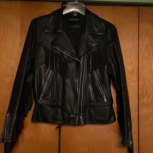 Vintage Harley Davidson fringed leather jacket with quilted lining.